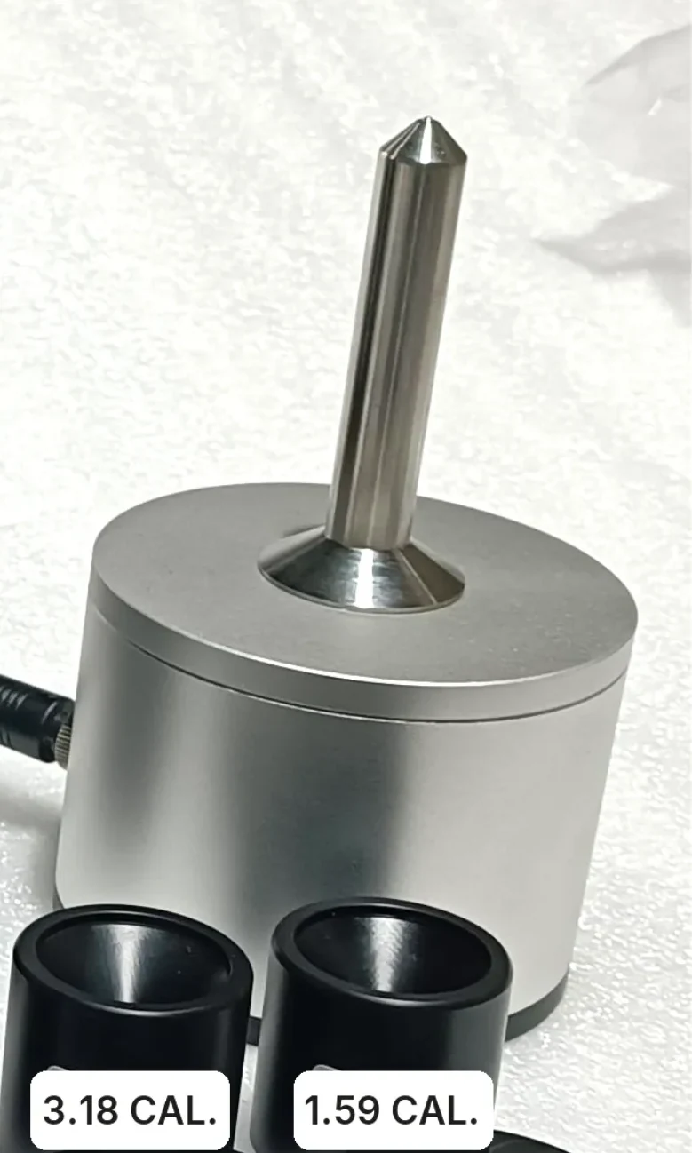 Probe of the KHT MTG-100 with calibration fixtures and steel target balls