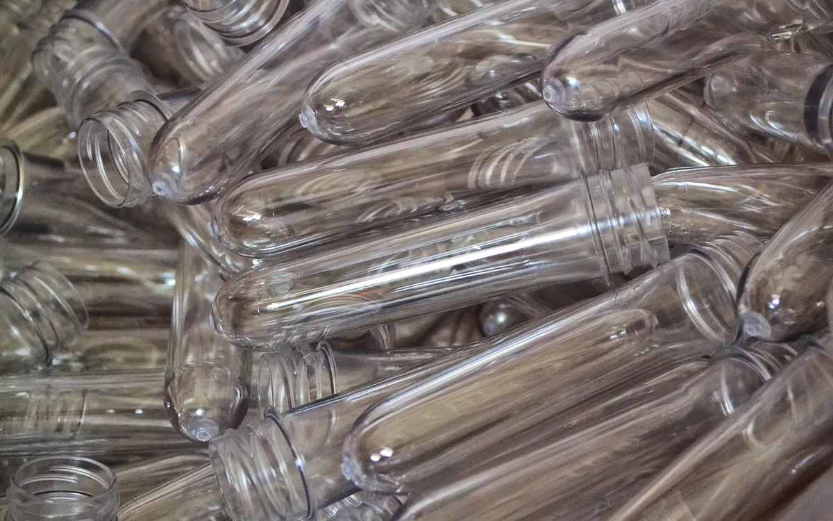 Clear PET preforms before blow moulding